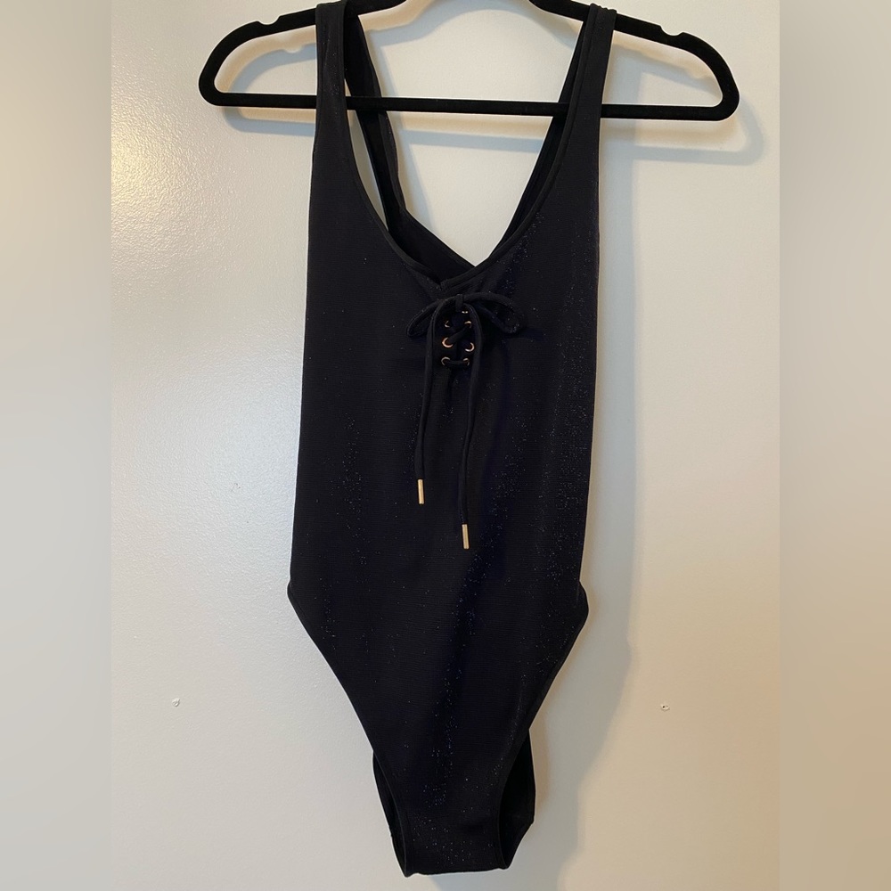 SavageX black bodysuit with blue & pink shimmer, front tie, sexy open back